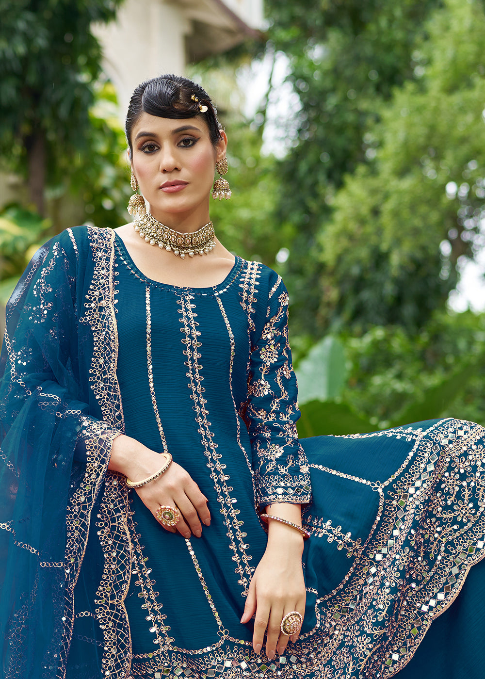 Buy Now Teal Chinnon Mirror Embroidered Palazzo Style Suit Online in New York, Toronto, Newark, Katy, Houston, Fremont, Dubai, Nevada & Worldwide at Empress.