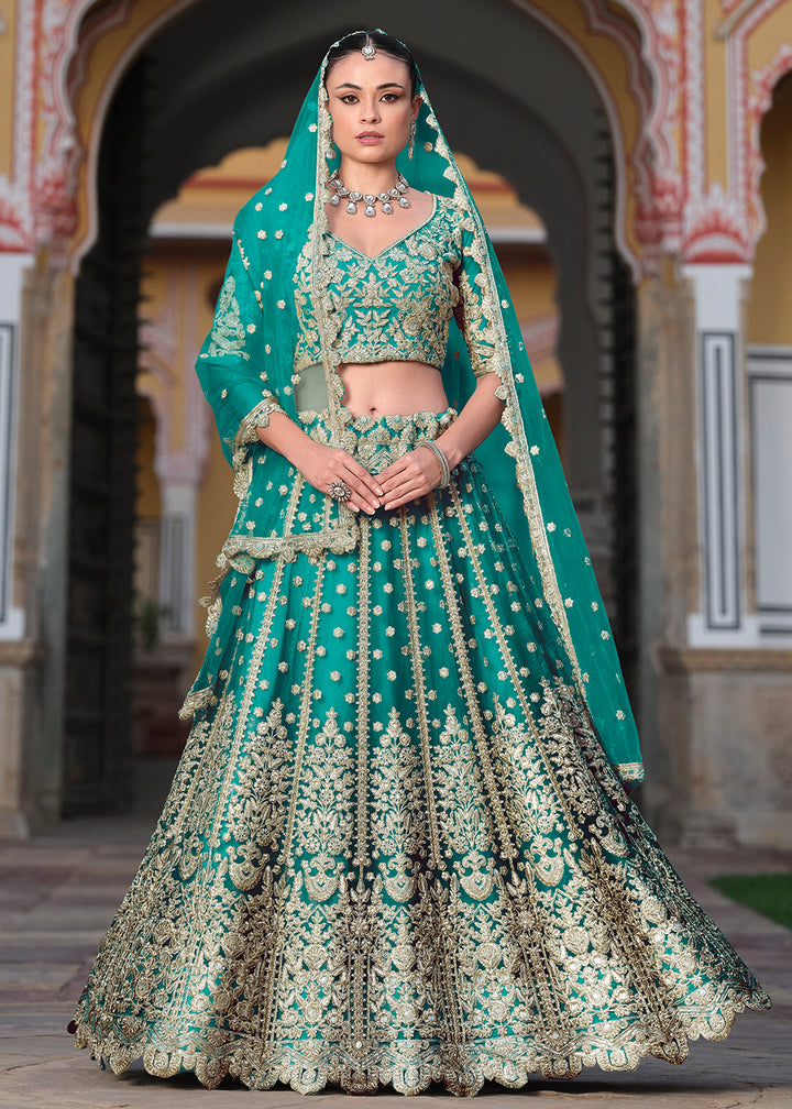 Buy Now Designer Rama Net Embroidered Wedding Lehenga Choli Online in USA, UK, Canada, France & Worldwide at Empress Clothing. 