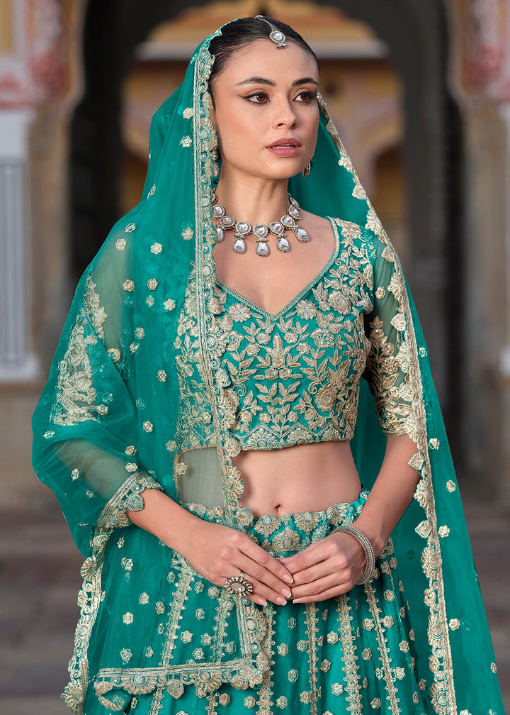 Buy Now Designer Rama Net Embroidered Wedding Lehenga Choli Online in USA, UK, Canada, France & Worldwide at Empress Clothing. 