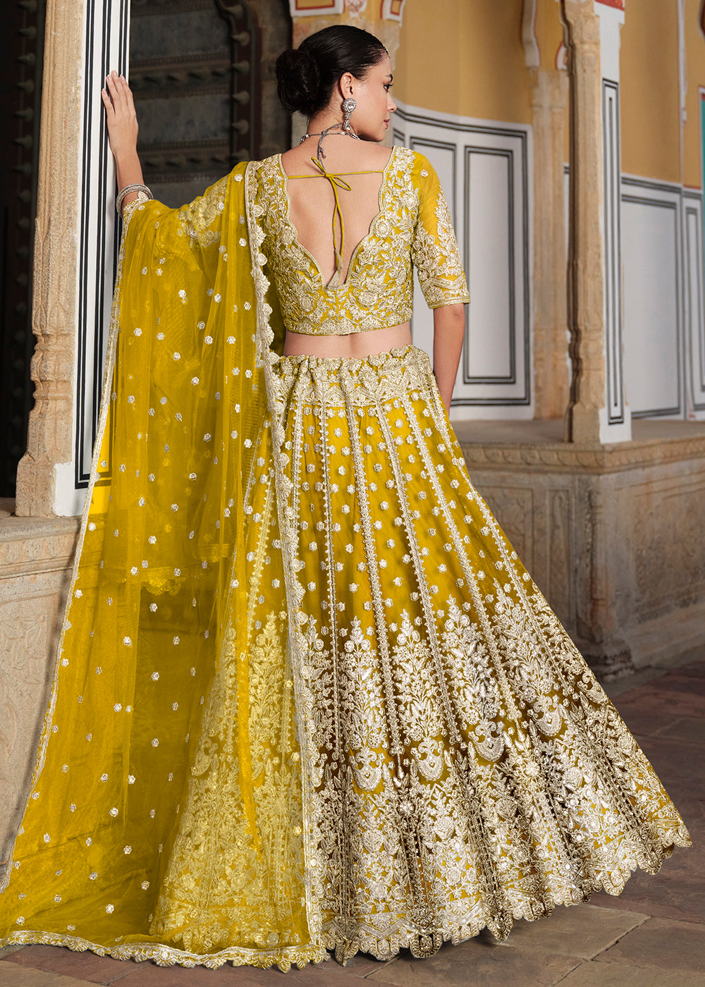 Buy Now Designer Yellow Net Embroidered Wedding Lehenga Choli Online in USA, UK, Canada, France & Worldwide at Empress Clothing.