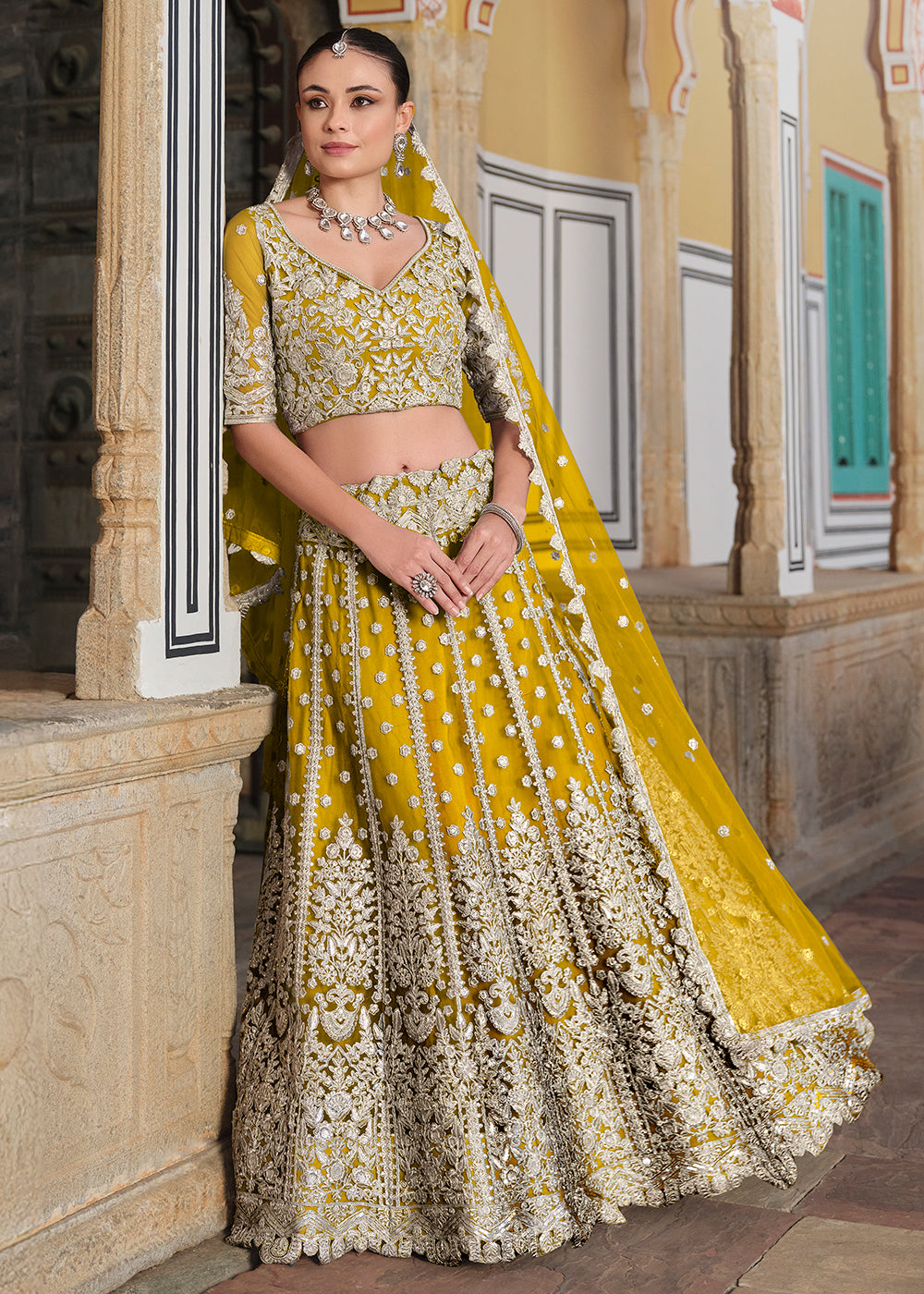 Buy Now Designer Yellow Net Embroidered Wedding Lehenga Choli Online in USA, UK, Canada, France & Worldwide at Empress Clothing.