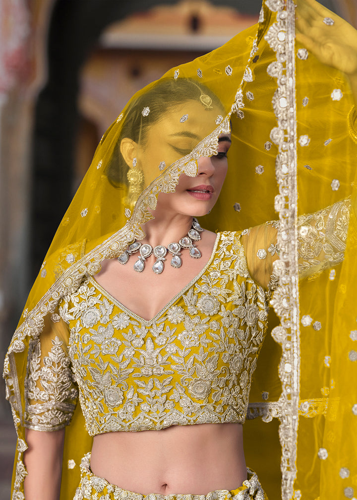 Buy Now Designer Yellow Net Embroidered Wedding Lehenga Choli Online in USA, UK, Canada, France & Worldwide at Empress Clothing.