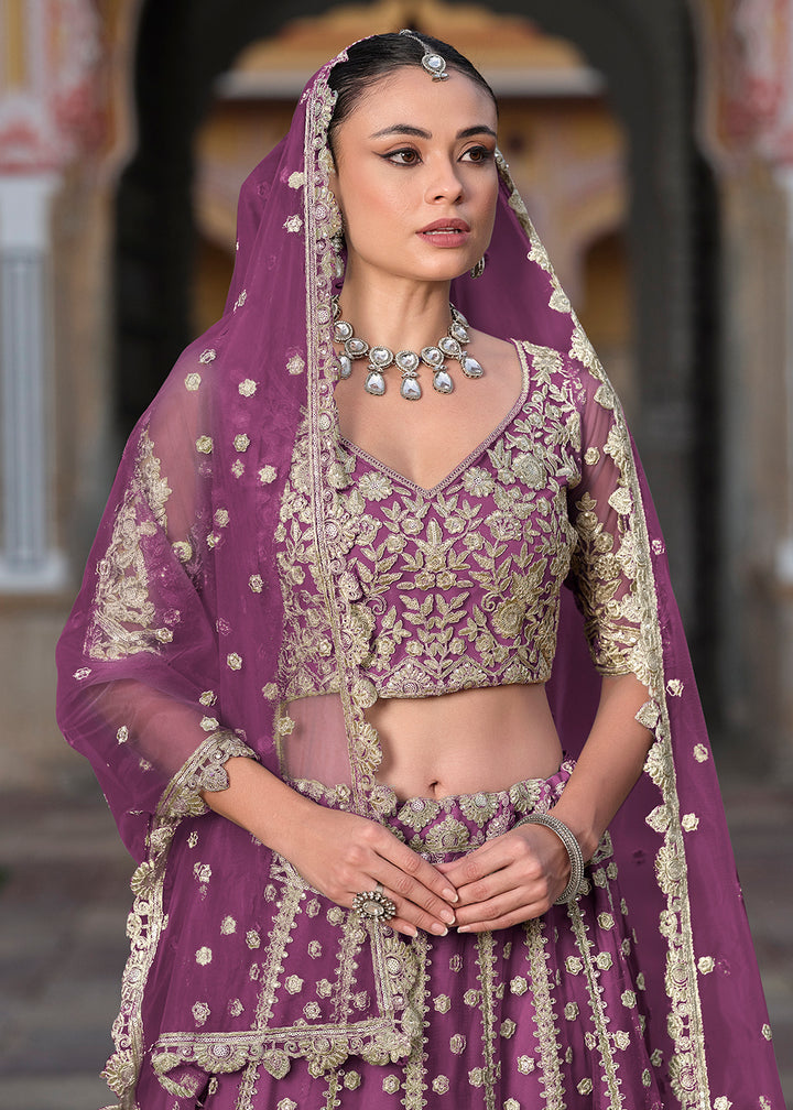 Buy Now Designer Purple Net Embroidered Wedding Lehenga Choli Online in USA, UK, Canada, France & Worldwide at Empress Clothing.