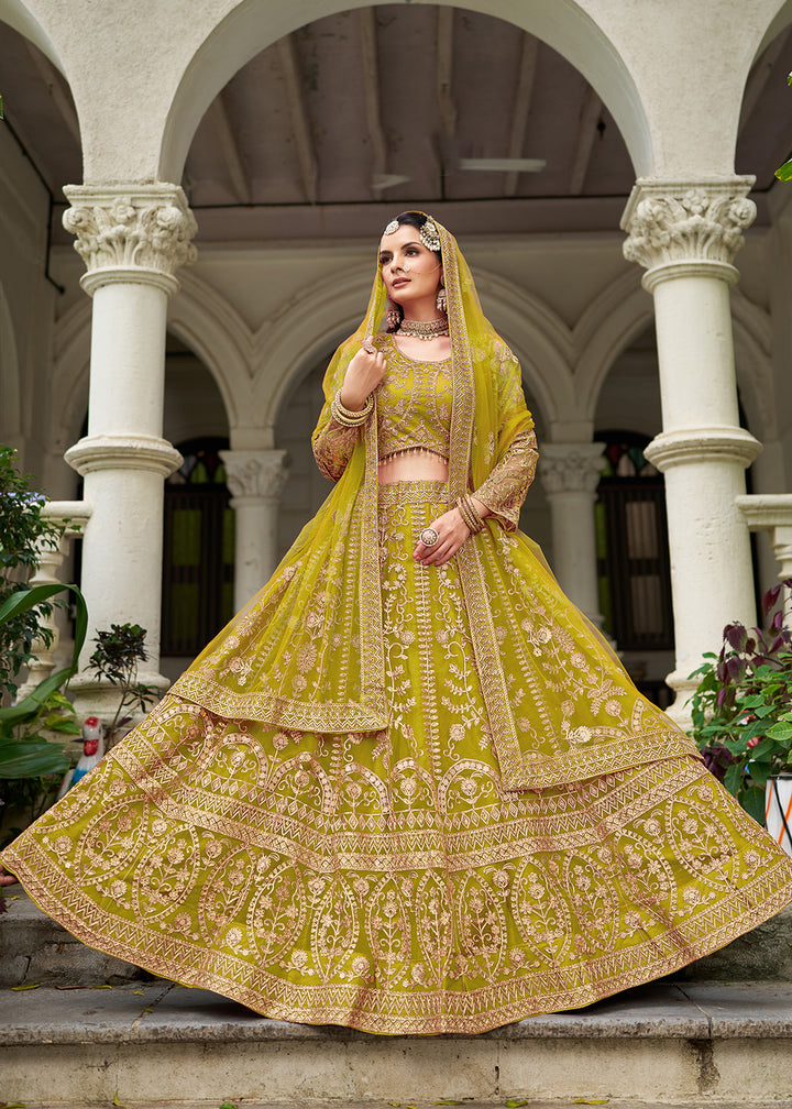 Buy Now Wedding Wear Net Green Embroidered Lehenga Choli Online in US, UK, Canada, France, Germany, Sweden, Denmark, Greece, Ireland, UAE & Worldwide at Empress.