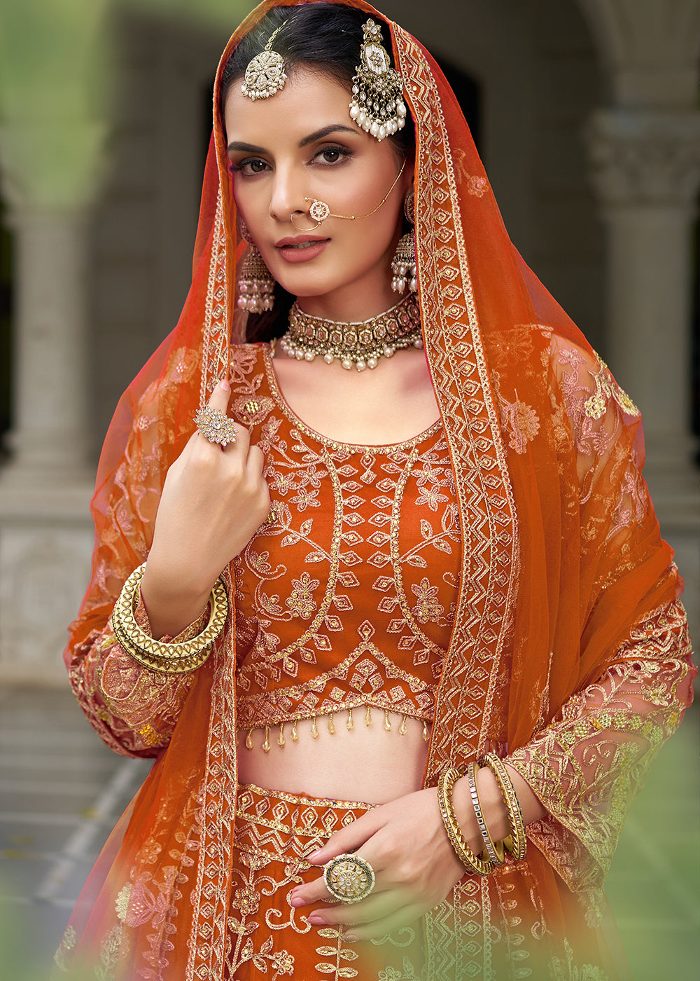 Buy Now Wedding Wear Net Orange Embroidered Lehenga Choli Online in US, UK, Canada, France, Germany, Sweden, Denmark, Greece, Ireland & Worldwide at Empress.