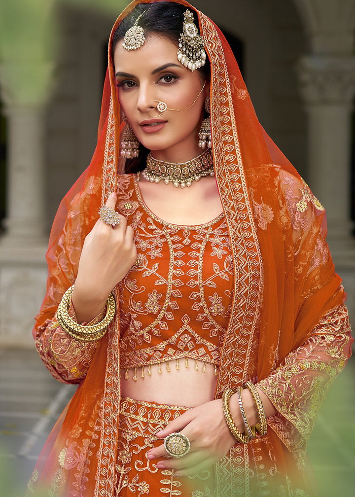 Buy Now Wedding Wear Net Orange Embroidered Lehenga Choli Online in US, UK, Canada, France, Germany, Sweden, Denmark, Greece, Ireland & Worldwide at Empress.