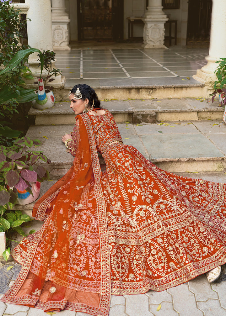 Buy Now Wedding Wear Net Orange Embroidered Lehenga Choli Online in US, UK, Canada, France, Germany, Sweden, Denmark, Greece, Ireland & Worldwide at Empress.