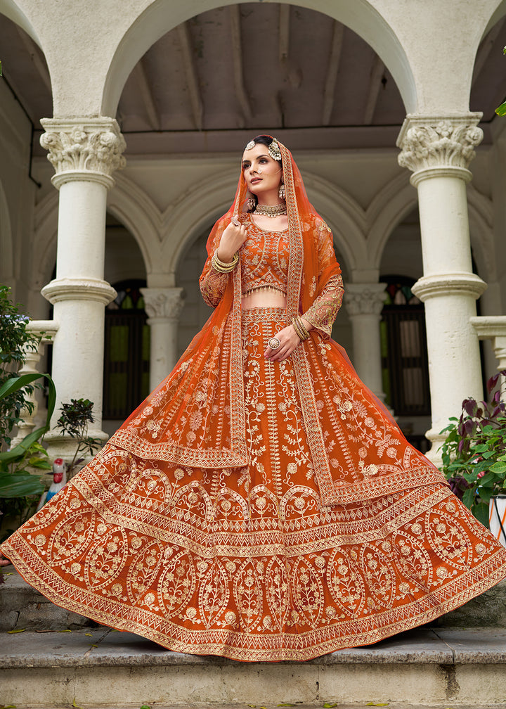 Buy Now Wedding Wear Net Orange Embroidered Lehenga Choli Online in US, UK, Canada, France, Germany, Sweden, Denmark, Greece, Ireland & Worldwide at Empress.