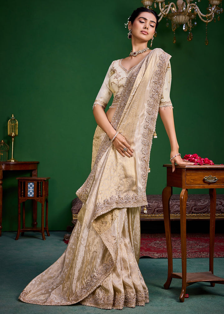 Buy Now Cream Tissue Fabric Heavy Designer Wear Saree Online in US, UK, Canada, France, Germany, Denmark, Sweden, Italy, Greece, UAE &amp; Worldwide at Empress