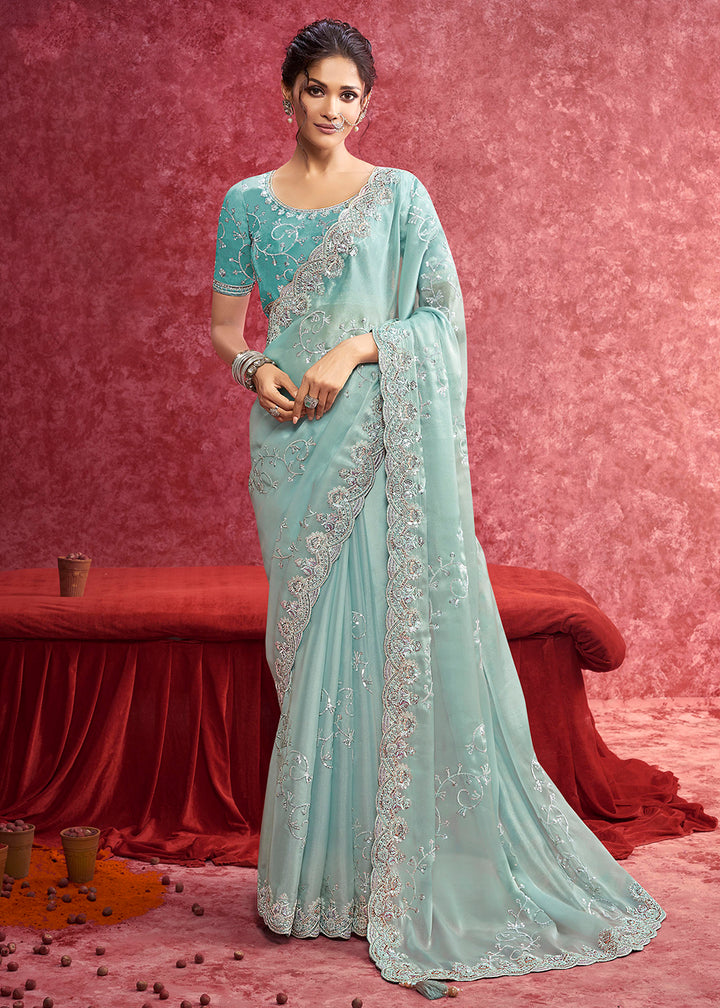 Buy Exquisite Mint Blue Embroidered Wedding Wear Saree Online in US, UK, Canada, France, Germany, Italy, Denmark, Singapore, Belgium & Worldwide at Empress.