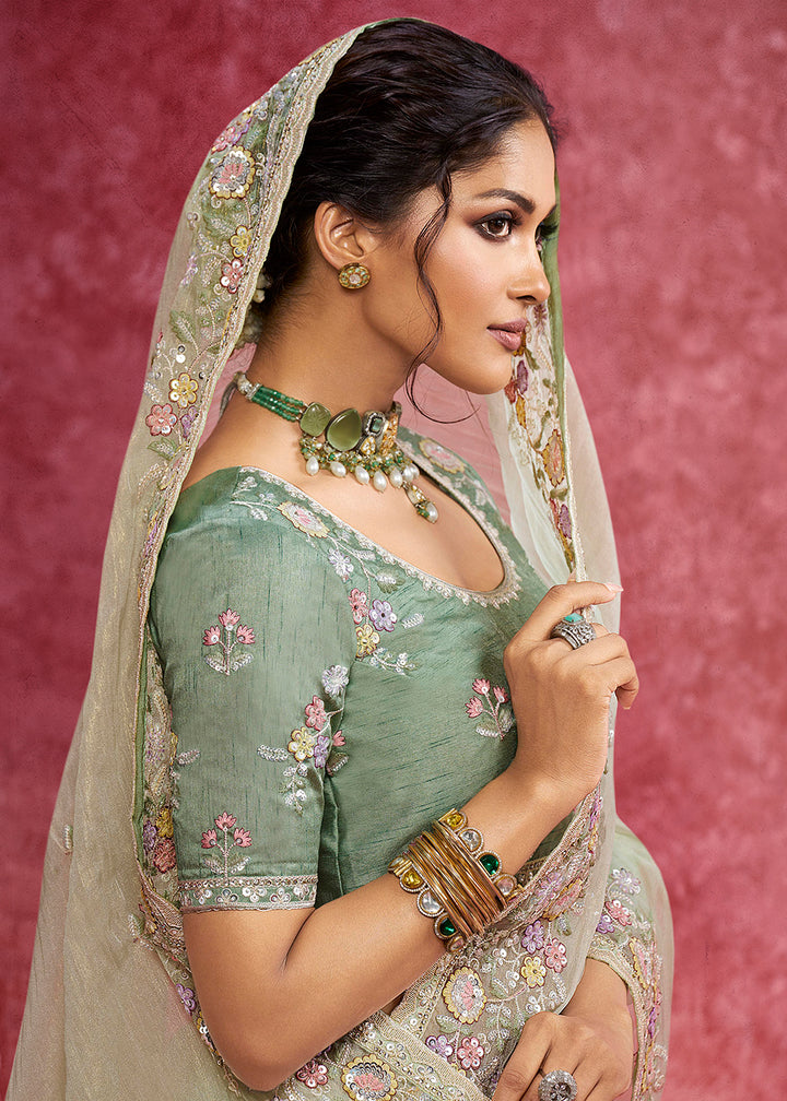 Buy Exquisite Green Embroidered Wedding Wear Saree Online in US, UK, Canada, France, Germany, Italy, Denmark, Singapore, Belgium, UAE & Worldwide at Empress.