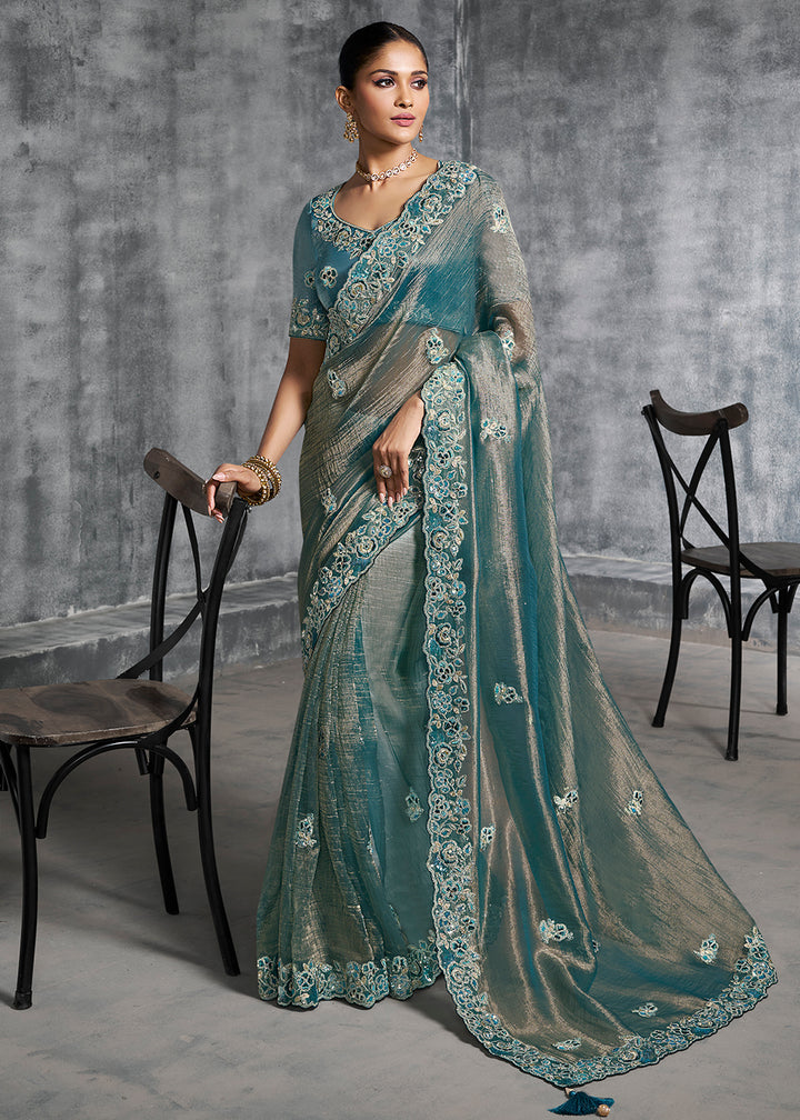 Buy Gorgeous Teal Blue Tissue Zari Party Wear Designer Saree Online in US, UK, Canada, France, Germany, Italy, Denmark, Spain, Belgium & Worldwide at Empress.