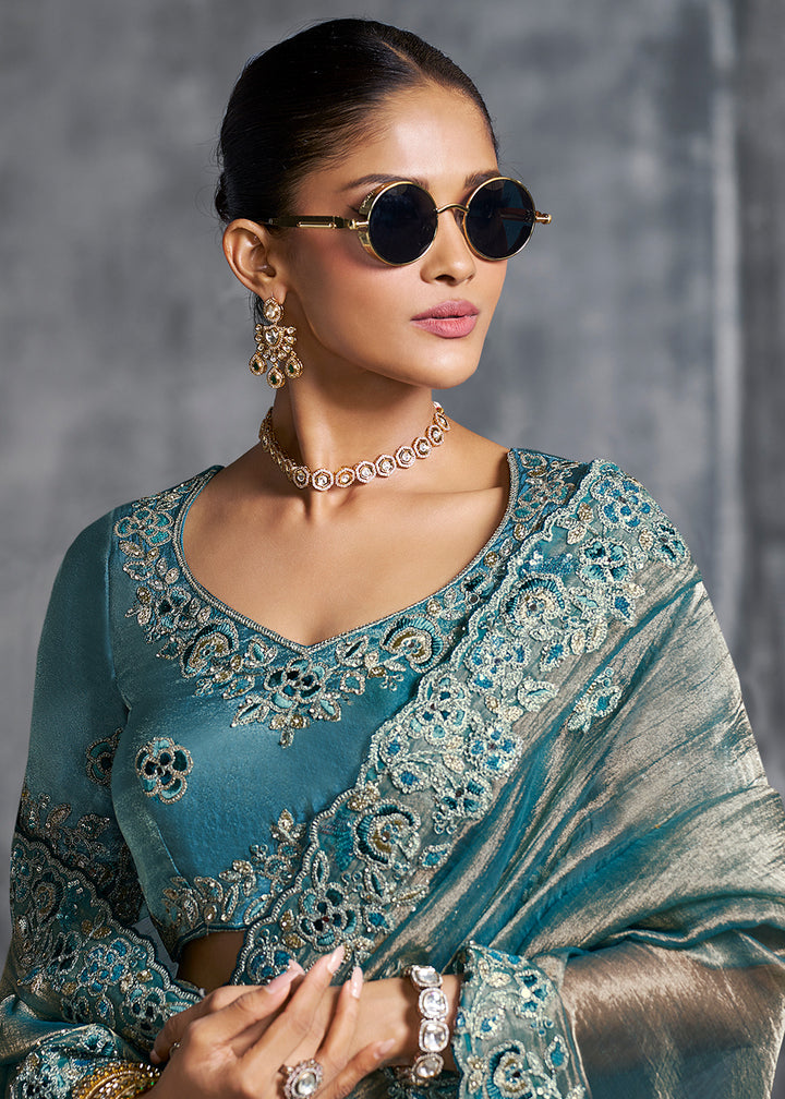 Buy Gorgeous Teal Blue Tissue Zari Party Wear Designer Saree Online in US, UK, Canada, France, Germany, Italy, Denmark, Spain, Belgium & Worldwide at Empress.