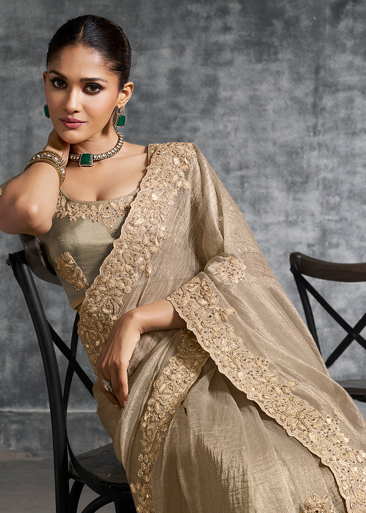 Buy Gorgeous Beige Tissue Zari Party Wear Designer Saree Online in US, UK, Canada, France, Germany, Italy, Denmark, Spain, Belgium & Worldwide at Empress.
