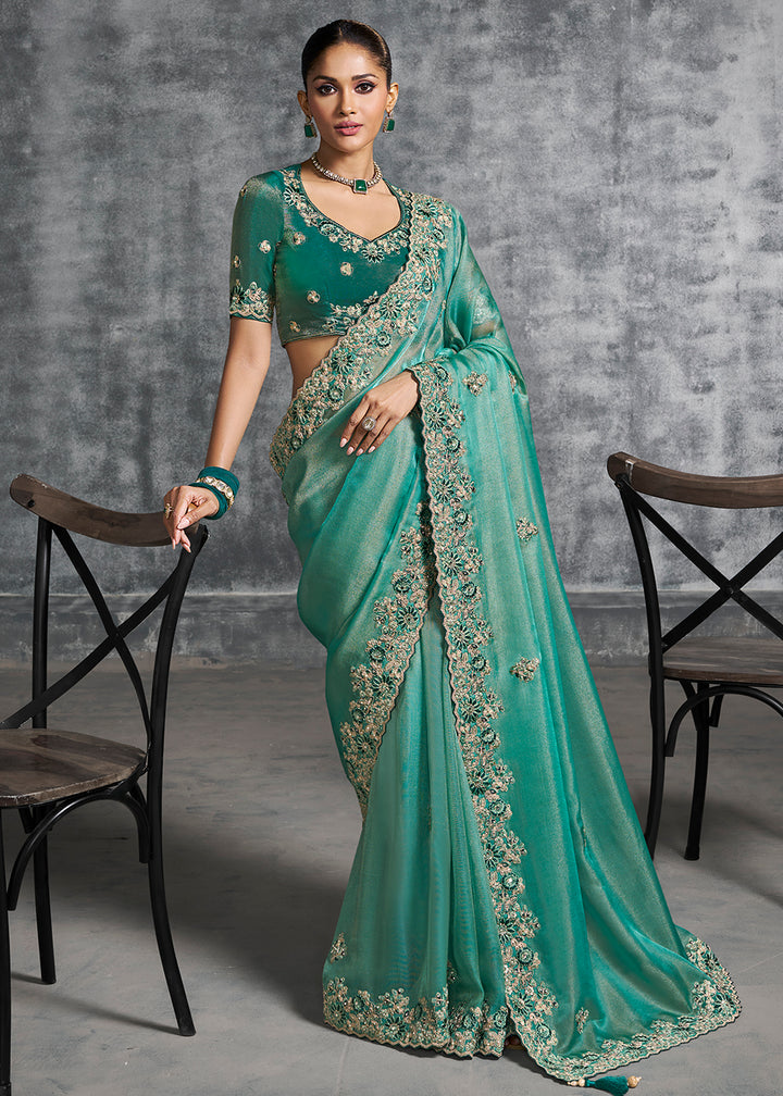Buy Gorgeous Turquoise Tissue Zari Party Wear Designer Saree Online in US, UK, Canada, France, Germany, Italy, Denmark, Spain, Belgium & Worldwide at Empress.