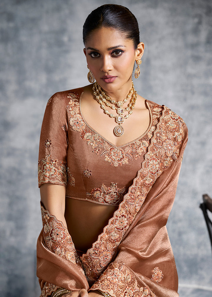 Buy Gorgeous Rust Tissue Zari Party Wear Designer Saree Online in US, UK, Canada, France, Germany, Italy, Denmark, Spain, Belgium, UAE & Worldwide at Empress.