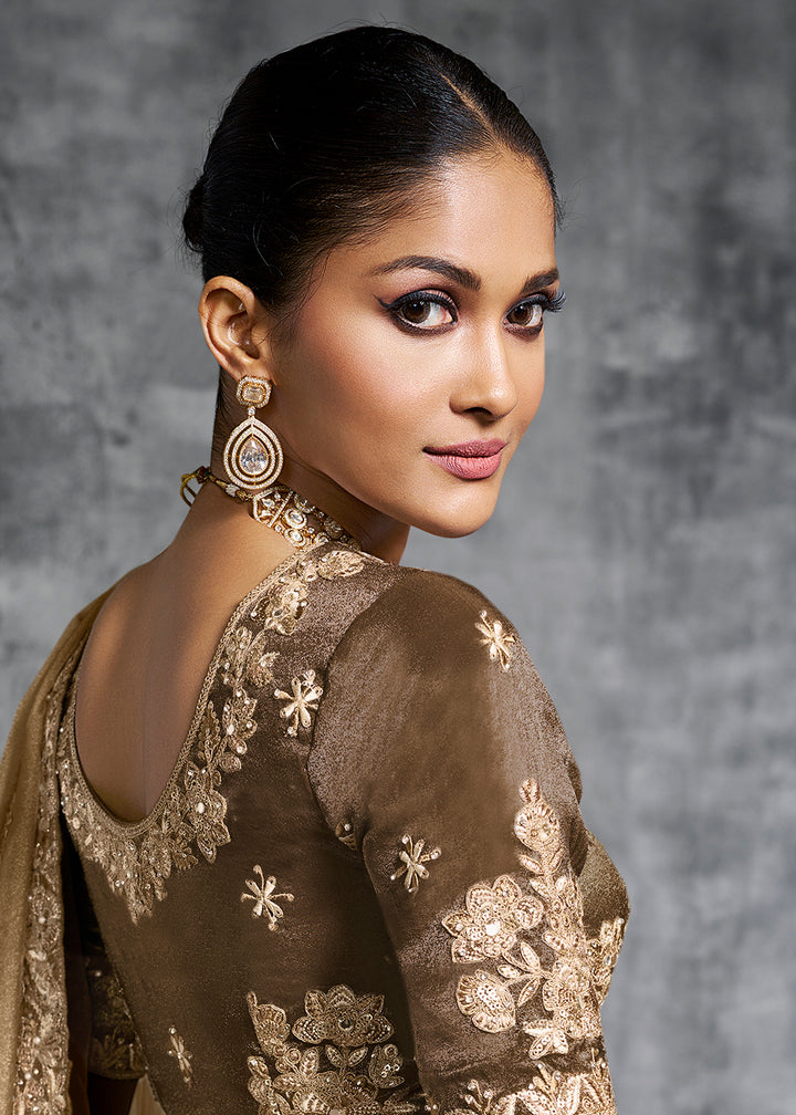 Buy Gorgeous Brown Tissue Zari Party Wear Designer Saree Online in US, UK, Canada, France, Germany, Italy, Denmark, Spain, Belgium, UAE & Worldwide at Empress.