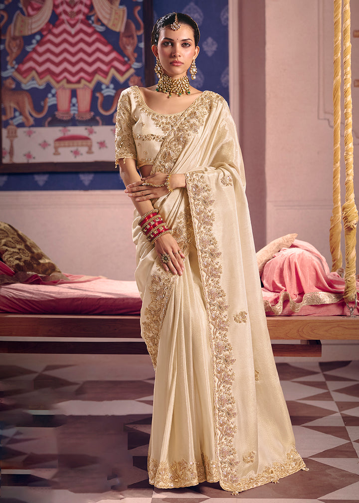 Buy Now Cream Premium Tissue Zari Embroidered Designer Saree Online in US, UK, Canada, France, Germany, Denmark, Netherland, Sweden, UAE & Worldwide at Empress.