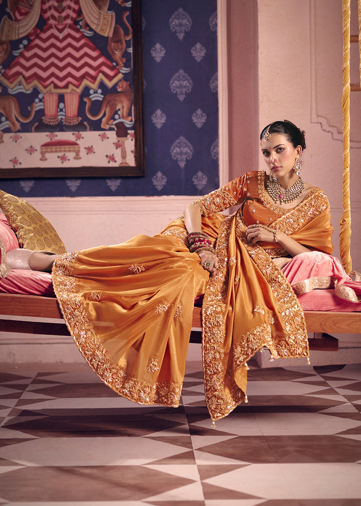 Buy Now Orange Premium Tissue Zari Embroidered Designer Saree Online in US, UK, Canada, France, Germany, Denmark, Netherland, Sweden, UAE & Worldwide at Empress.