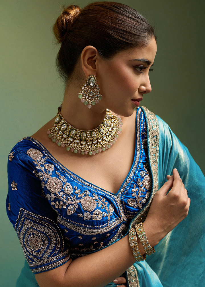 Buy Now Turquoise &amp; Blue Silky Velvet Satin Wedding Designer Saree Online in US, UK, Canada, France, Germany, Denmark, Sweden, Italy, UAE &amp; Worldwide at Empress.