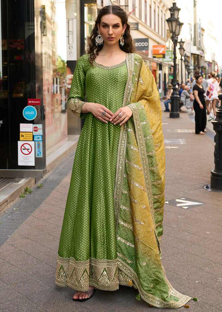 Buy Now Green Pure Viscose Jacquard Silk Festive Anarkali Gown Online in US, UK, Canada, France, Italy, Sweden, Ireland, Denmark, Greece & Worldwide at Empress.