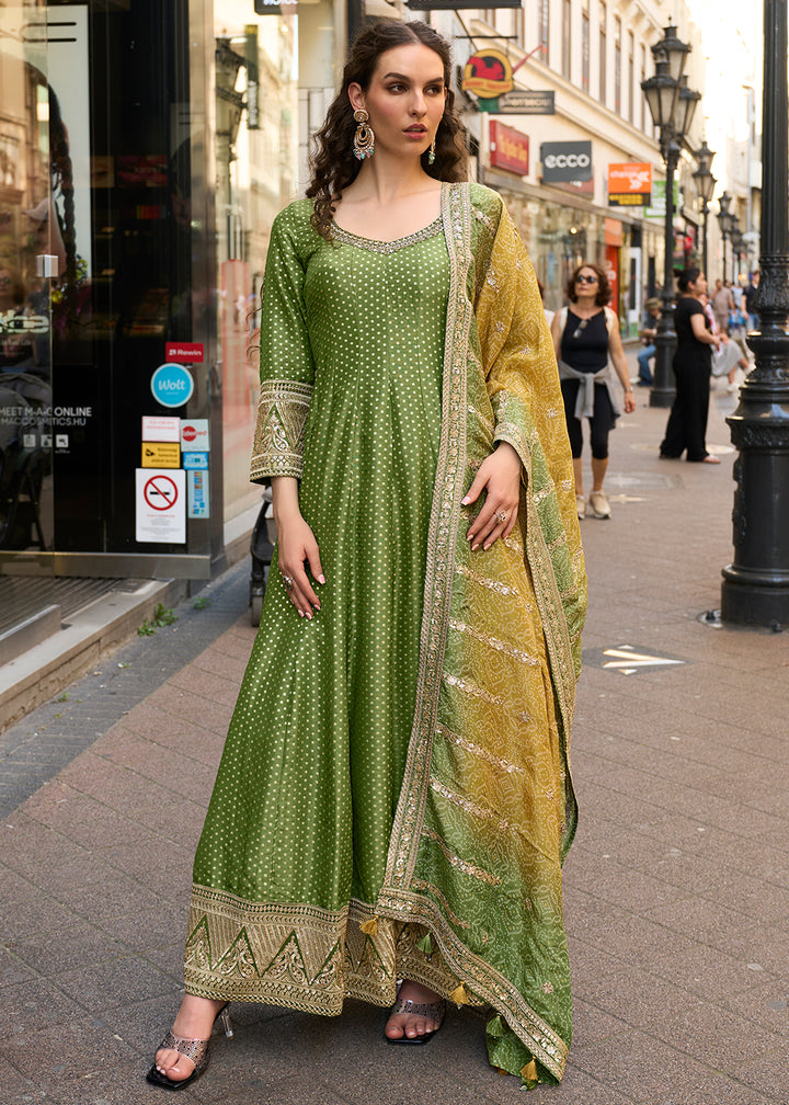 Buy Now Green Pure Viscose Jacquard Silk Festive Anarkali Gown Online in US, UK, Canada, France, Italy, Sweden, Ireland, Denmark, Greece & Worldwide at Empress.