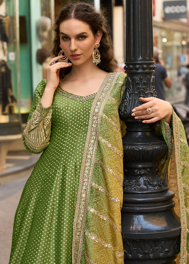 Buy Now Green Pure Viscose Jacquard Silk Festive Anarkali Gown Online in US, UK, Canada, France, Italy, Sweden, Ireland, Denmark, Greece & Worldwide at Empress.