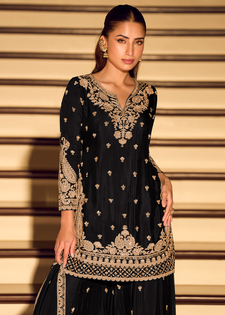 Shop NowGold Embroidered Black Eid Style Sharara Suit Online at Empress in US, UK, Canada, Germany, Australia, Sweden, Denmark, Qatar, Africa, UAE & Worldwide.