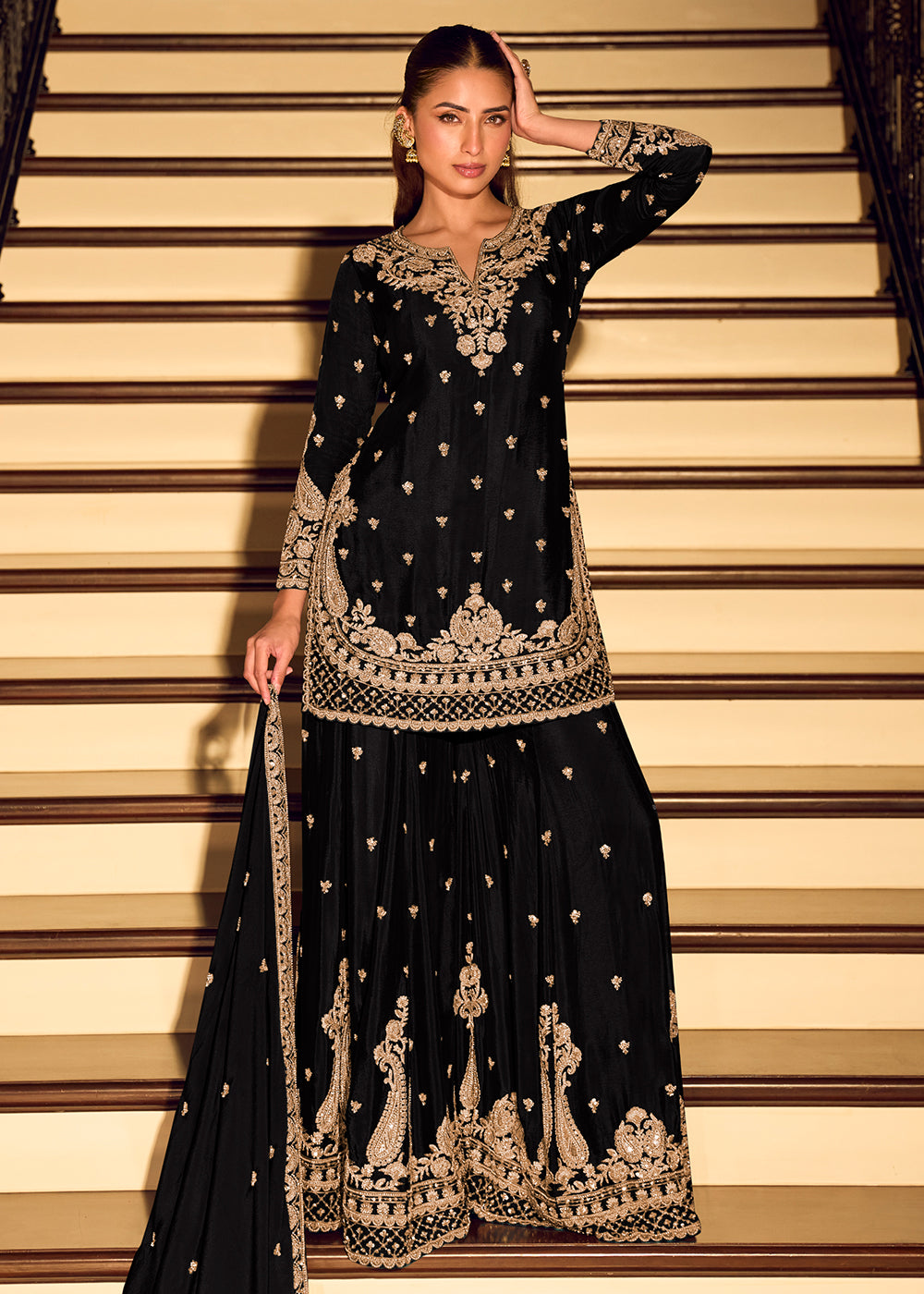 Shop NowGold Embroidered Black Eid Style Sharara Suit Online at Empress in US, UK, Canada, Germany, Australia, Sweden, Denmark, Qatar, Africa, UAE & Worldwide.