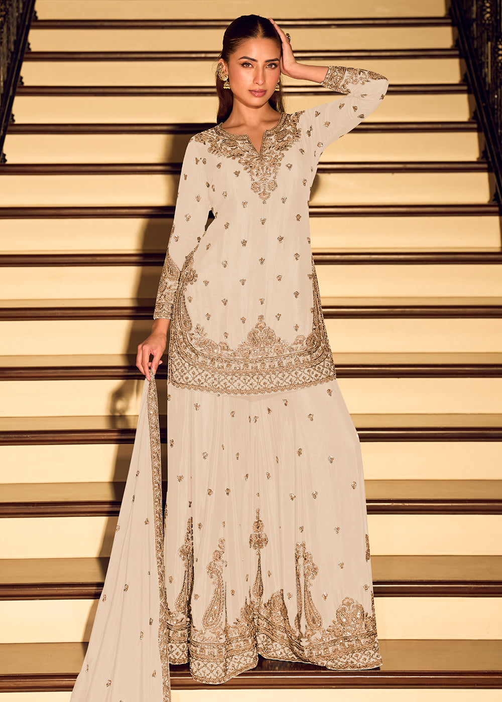 Shop Now Gold Embroidered Off White Eid Style Sharara Suit Online at Empress in US, UK, Canada, Germany, Australia, Sweden, Denmark, Qatar, Africa & Worldwide.