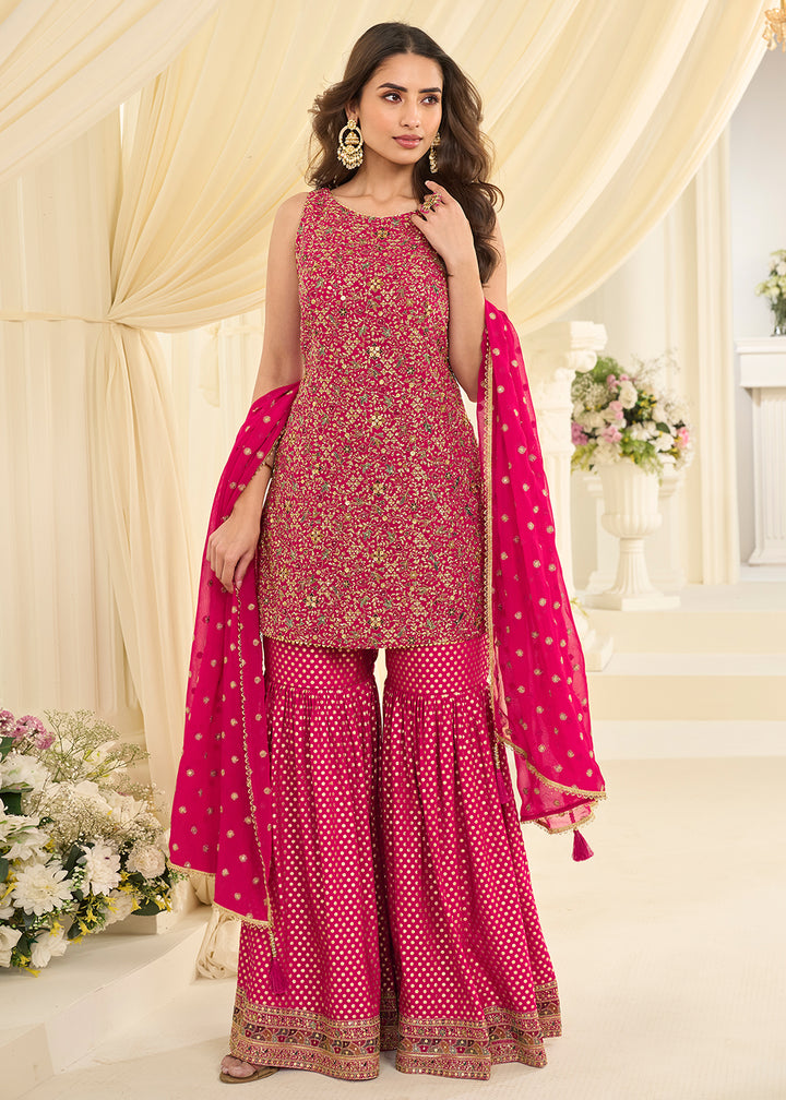 Shop Now Pink Premium Georgette Swarovski Zarkan Festive Gharara Suit Online at Empress in US, UK, Canada, Germany, Australia, Sweden, Denmark, UAE & Worldwide.