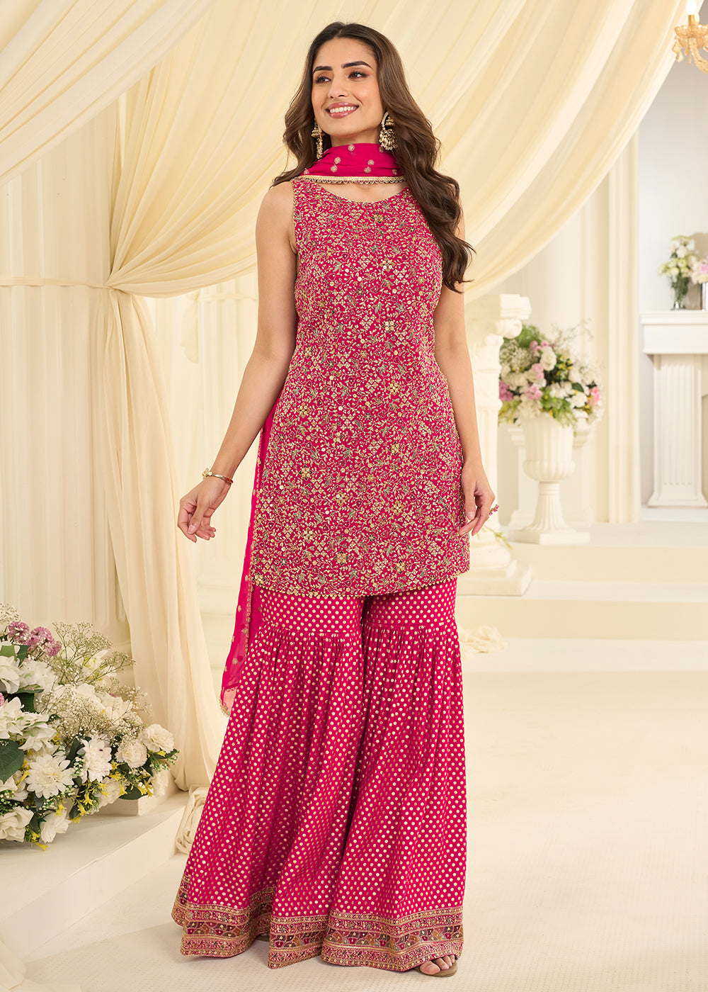 Shop Now Pink Premium Georgette Swarovski Zarkan Festive Gharara Suit Online at Empress in US, UK, Canada, Germany, Australia, Sweden, Denmark, UAE & Worldwide.