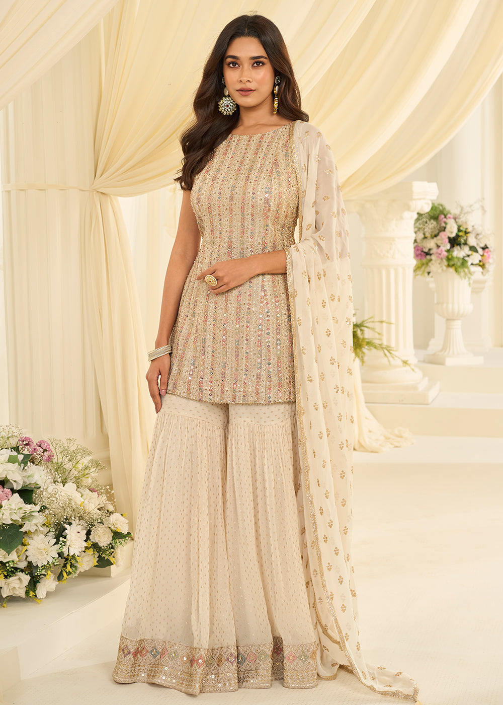 Shop Now Cream Premium Georgette Swarovski Zarkan Festive Gharara Suit Online at Empress in US, UK, Canada, Germany, Australia, Sweden, Denmark, UAE & Worldwide.
