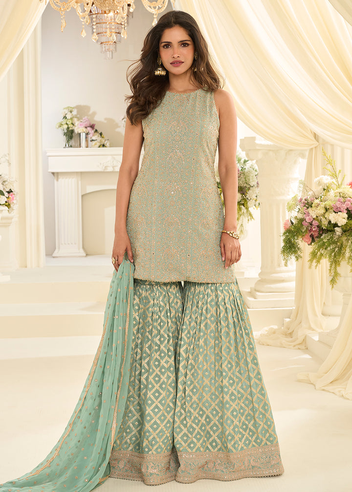 Shop Now Green Premium Georgette Swarovski Zarkan Festive Gharara Suit Online at Empress in US, UK, Canada, Germany, Australia, Sweden, Denmark, UAE & Worldwide