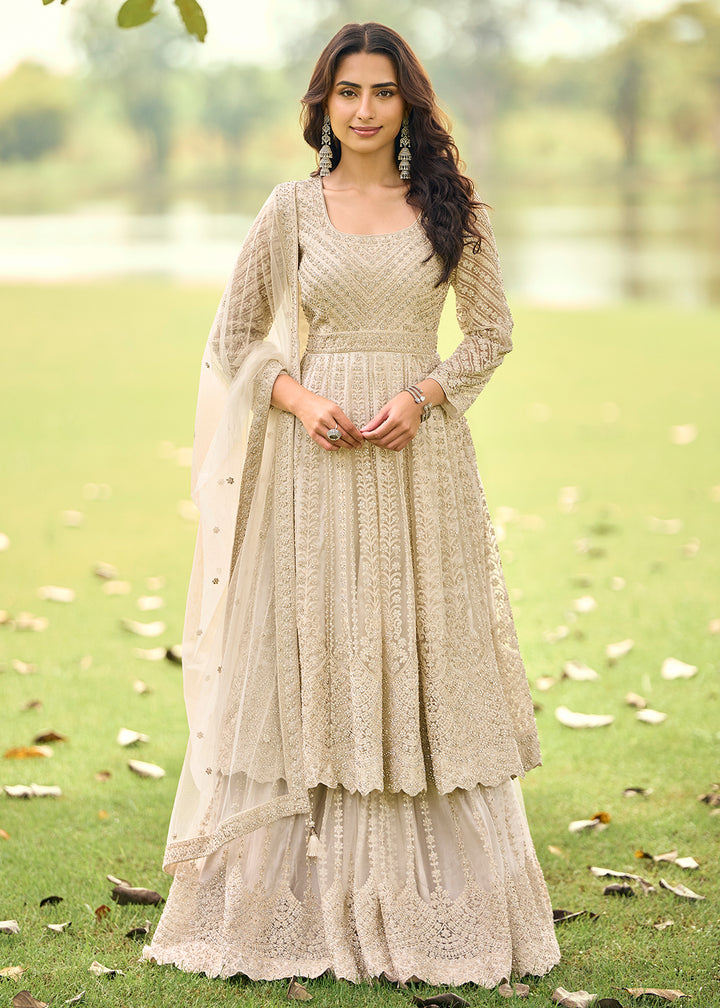 Buy Now Festive Eid Style Beige Embroidered Net Palazzo Suit Online in Toronto, Newark, Katy, Houston, Fremont, Dubai, Nevada, Kansas & Worldwide at Empress.