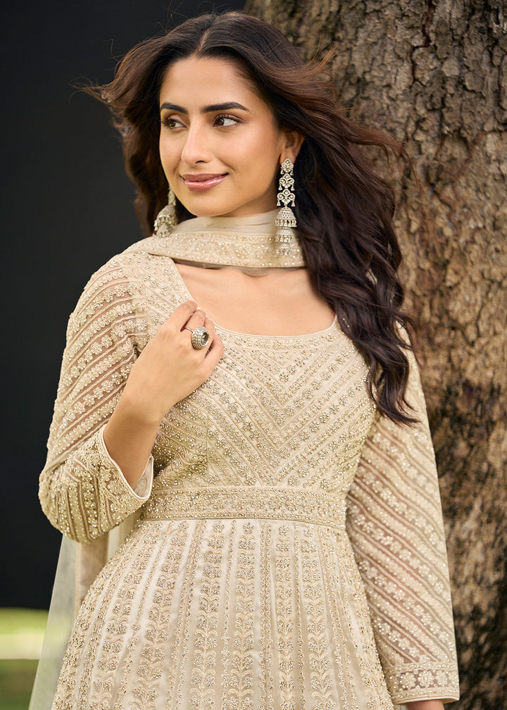 Buy Now Festive Eid Style Beige Embroidered Net Palazzo Suit Online in Toronto, Newark, Katy, Houston, Fremont, Dubai, Nevada, Kansas & Worldwide at Empress.