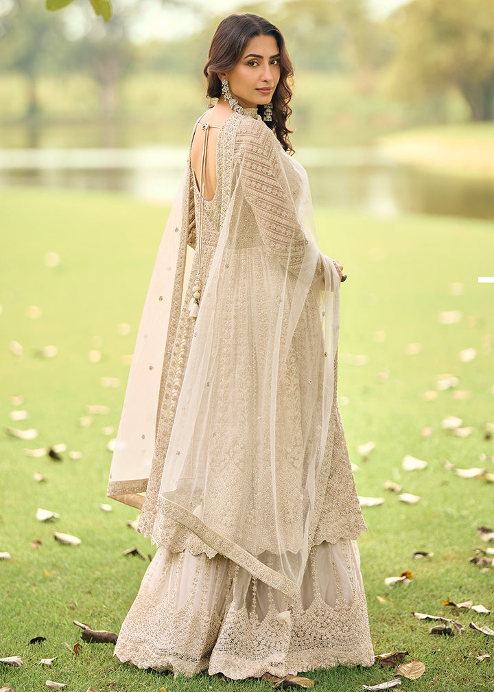 Buy Now Festive Eid Style Beige Embroidered Net Palazzo Suit Online in Toronto, Newark, Katy, Houston, Fremont, Dubai, Nevada, Kansas & Worldwide at Empress.