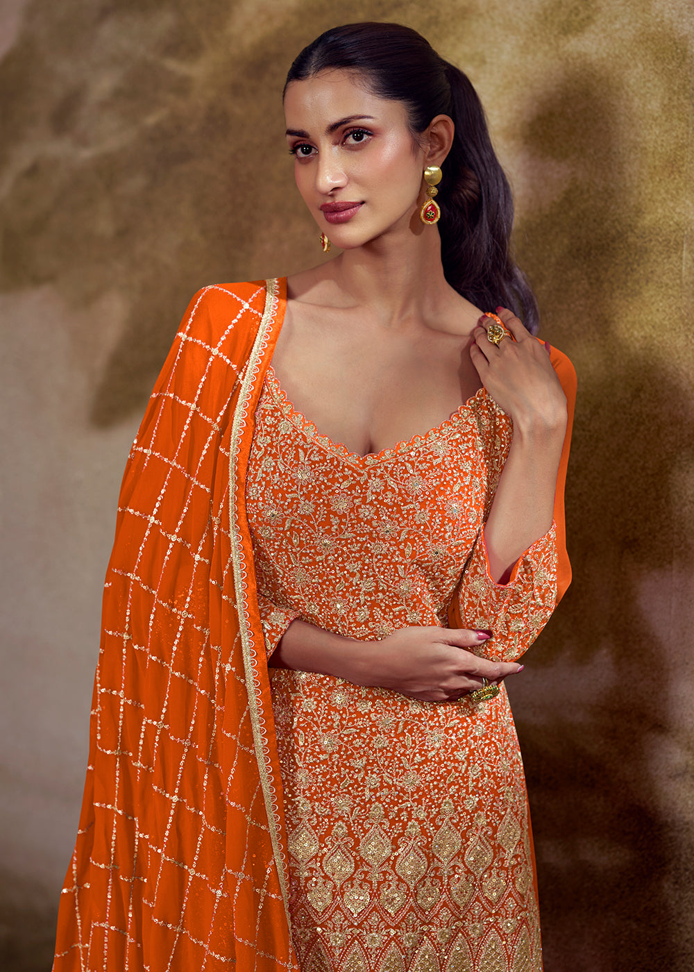 Shop Now Orange & Pink Zarkan Zari Embroidery Gharara Style Suit Online at Empress in US, UK, Canada, Italy, Germany, France, Greece, Sweden, UAE & Worldwide.