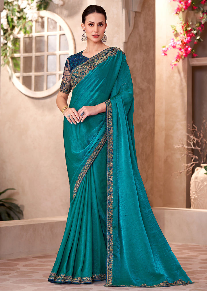 Buy Designer Style Teal Embroidered Wedding Saree Online in USA, UK, Canada, Spain, France, Germany, Italy, Austria, UAE, Singapore & Worldwide at Empress.