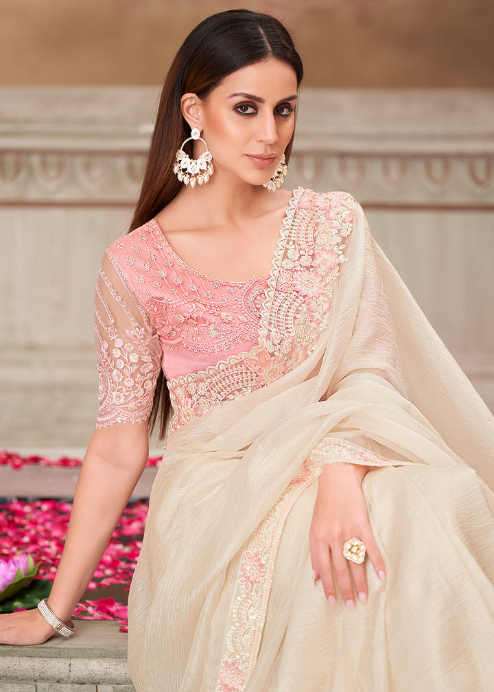 Buy Pearl White Satin Silk Embroidered Wedding Wear Saree Online in USA, UK, Canada, Spain, France, Germany, Italy, Austria, UAE & Worldwide at Empress Clothing