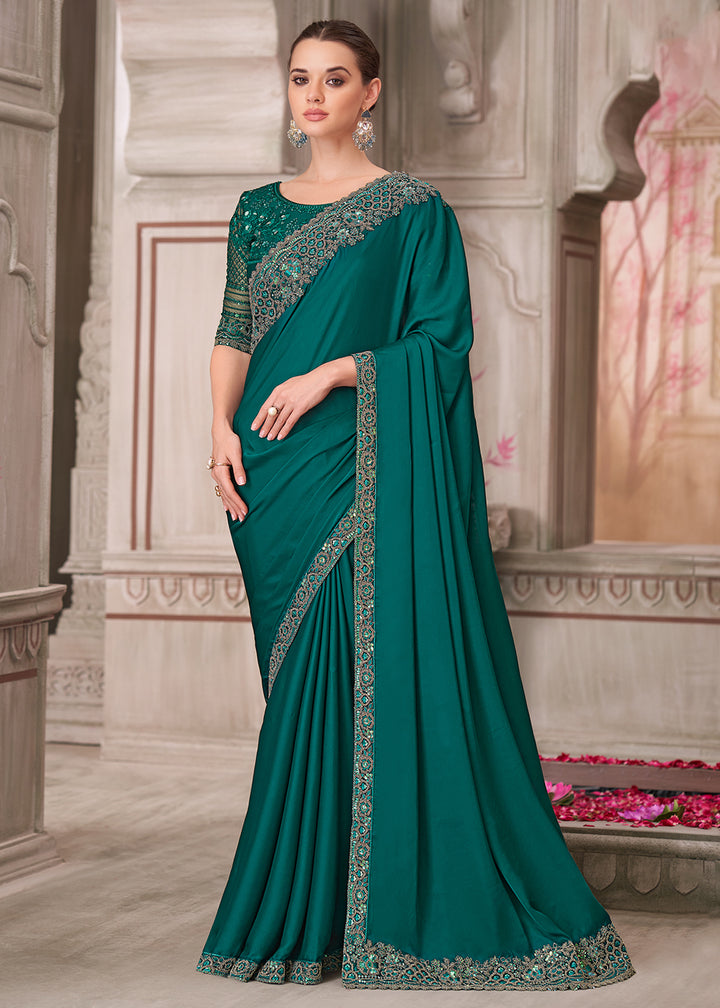 Buy Peacock Green Satin Silk Embroidered Wedding Wear Saree Online in USA, UK, Canada, Spain, France, Germany, Italy, Austria, UAE & Worldwide at Empress.
