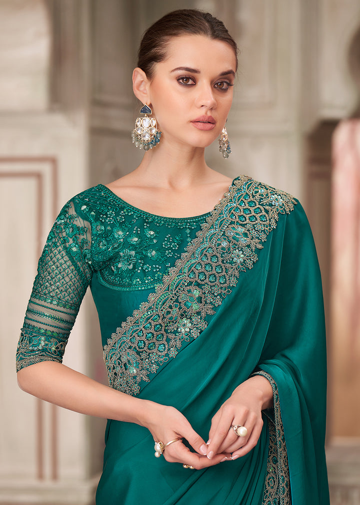 Buy Peacock Green Satin Silk Embroidered Wedding Wear Saree Online in USA, UK, Canada, Spain, France, Germany, Italy, Austria, UAE & Worldwide at Empress.