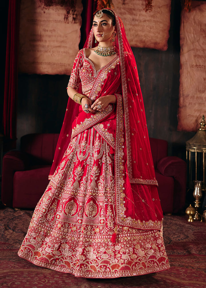 Shop Now Hot Red Heavy Embroidery with Double Dupatta Bridal Lehenga Choli Online in USA, UK, Canada, France, Germany, Austria, Italy &amp; Worldwide at Empress.
