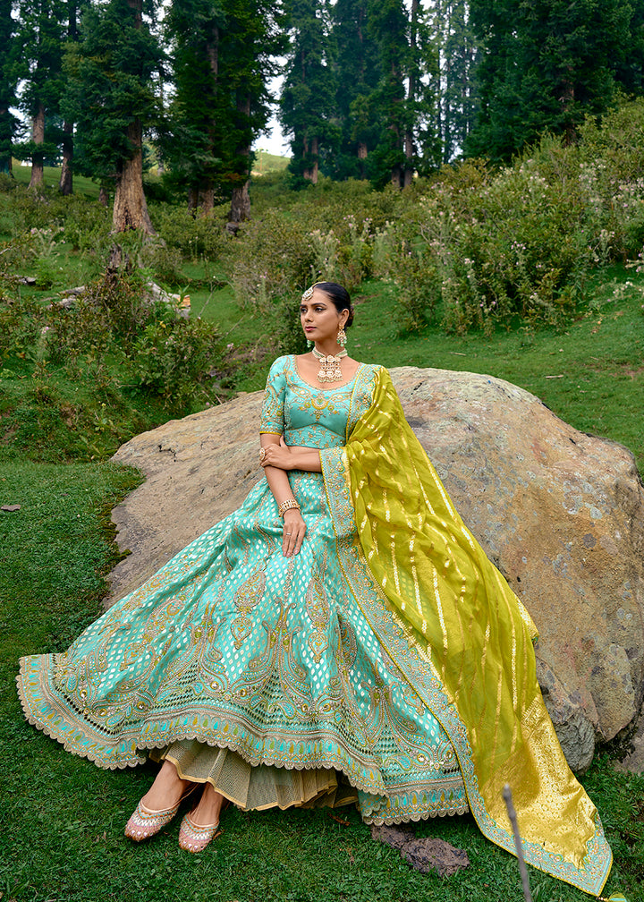 Buy Now Fancy Silk Turquoise Heavy Embroidered Designer Lehenga Choli Online in USA, UK, Canada & Worldwide at Empress Clothing. 