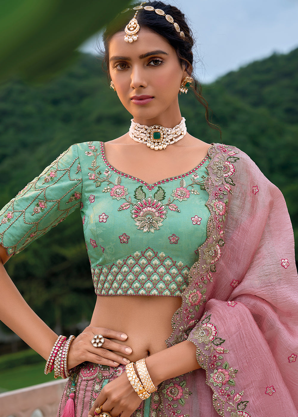 Buy Now Mint & Pink Heavy Embroidered Bridal Style Lehenga Choli Online in USA, UK, Canada, France & Worldwide at Empress Clothing. 