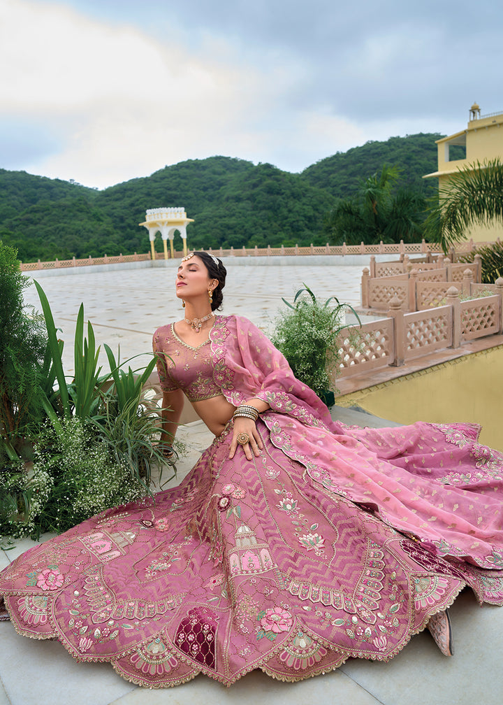 Buy Now Blush Pink Heavy Embroidered Bridal Style Lehenga Choli Online in USA, UK, Canada, France & Worldwide at Empress Clothing. 