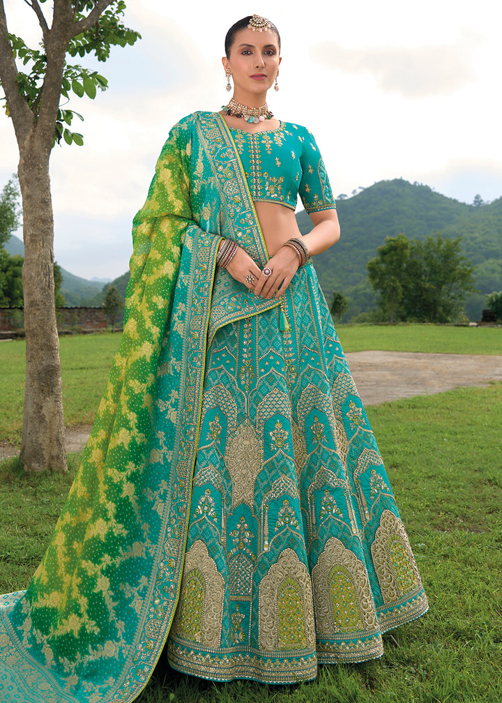 Buy Now Bridal Teal Blue Heavy Embroidered Designer Lehenga Choli Online in USA, UK, Canada, France & Worldwide at Empress Clothing. 