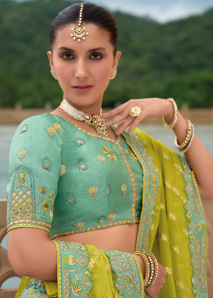 Buy Now Bridal Multi Green Heavy Embroidered Designer Lehenga Choli Online in USA, UK, Canada, France & Worldwide at Empress Clothing. 