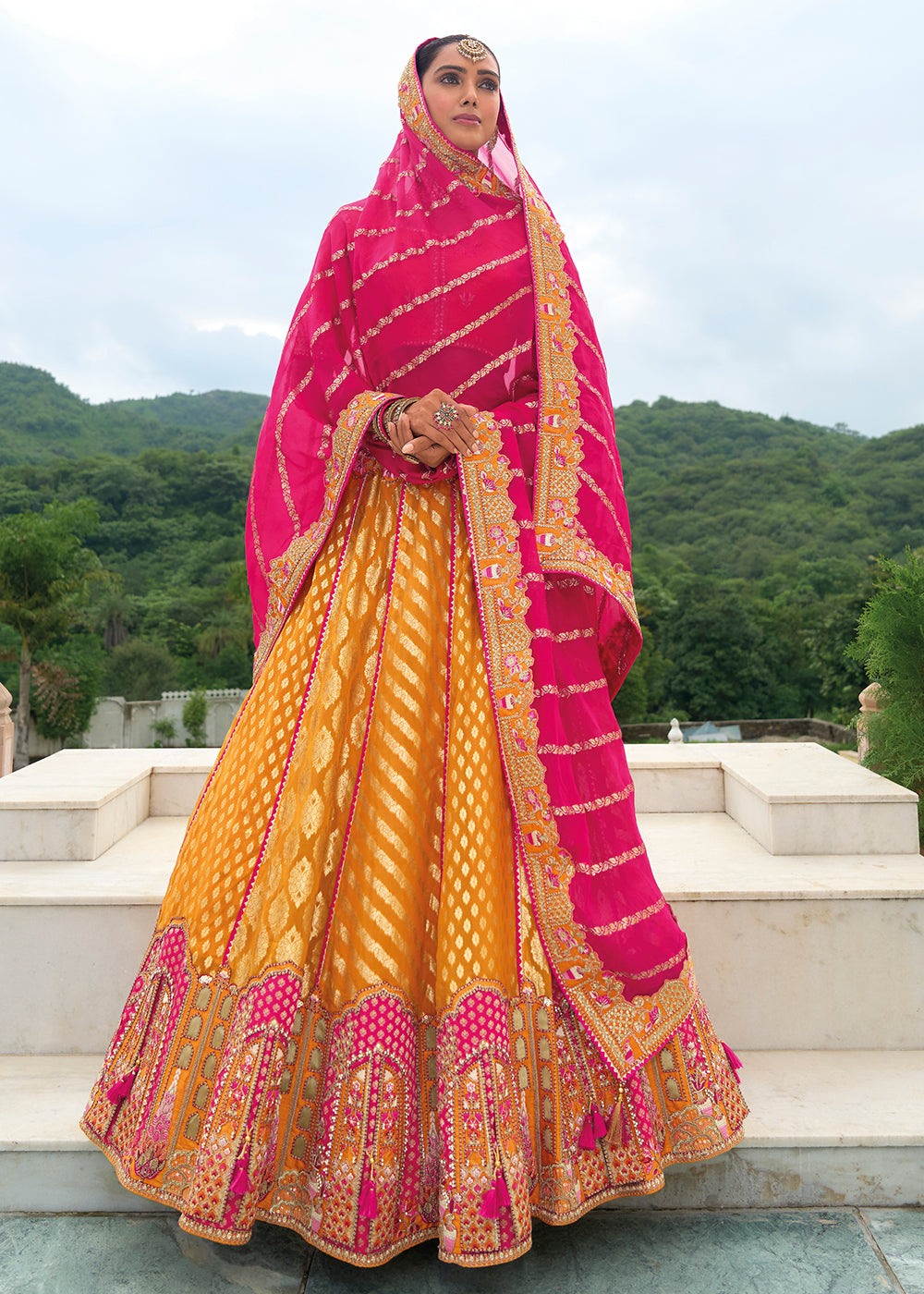 Buy Now Bridal Orange Pink Heavy Embroidered Designer Lehenga Choli Online in USA, UK, Canada, France & Worldwide at Empress Clothing.