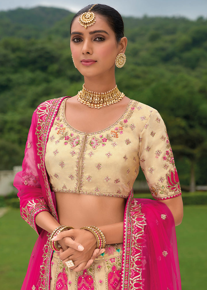 Buy Now Bridal Cream Pink Heavy Embroidered Designer Lehenga Choli Online in USA, UK, Canada, France & Worldwide at Empress Clothing. 